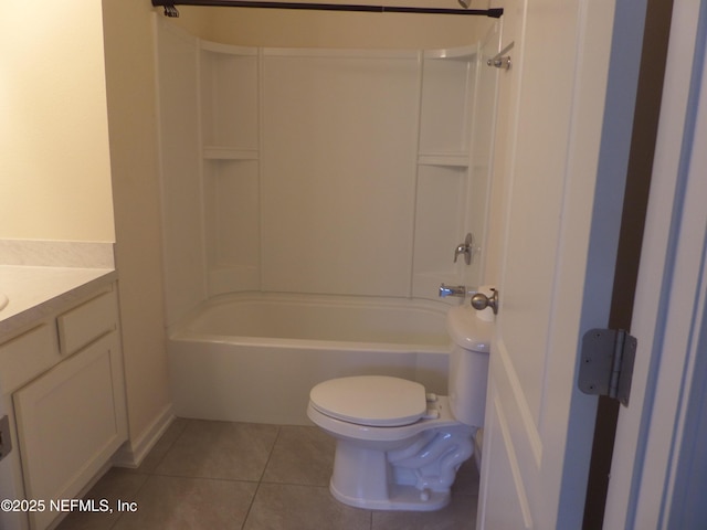 full bathroom with shower / tub combination, tile patterned floors, toilet, and vanity