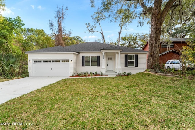 single story home with a garage and a front lawn