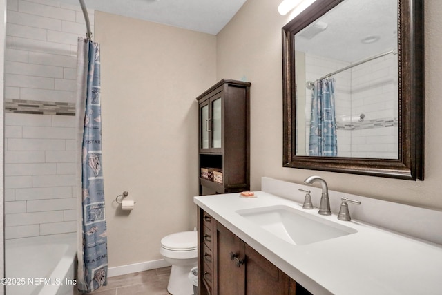 full bathroom with vanity, toilet, and shower / tub combo