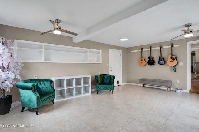 living area with beamed ceiling, tile patterned floors, and ceiling fan