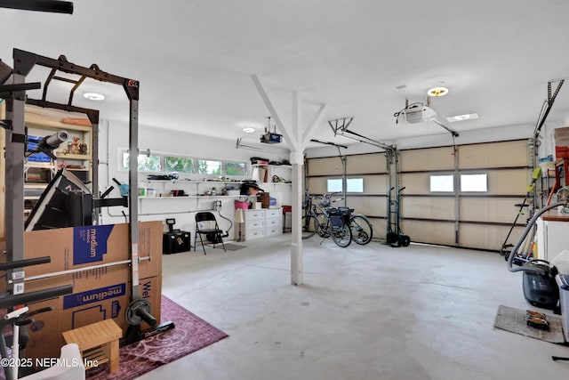 garage featuring a garage door opener