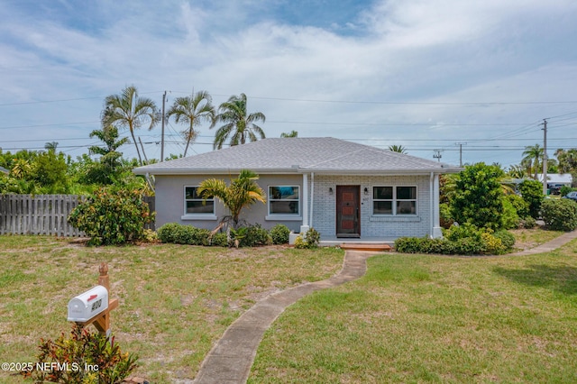 ranch-style house with a front yard