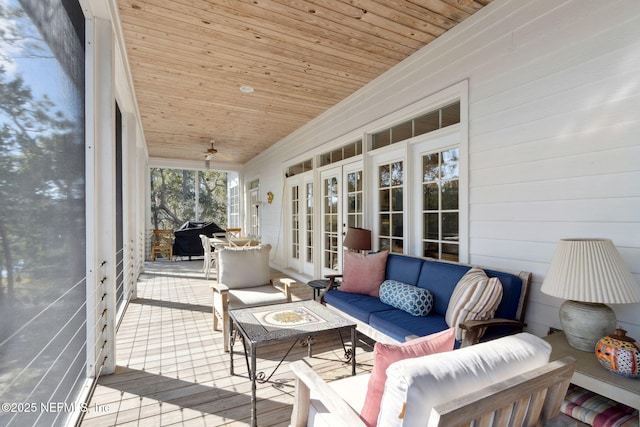 sunroom with wood ceiling