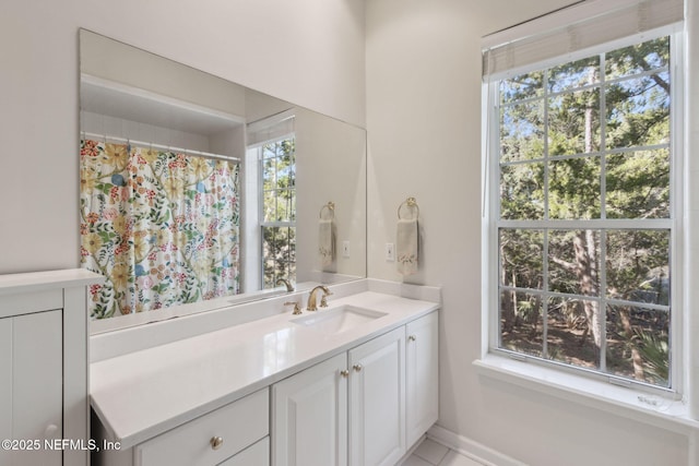 bathroom with vanity and walk in shower