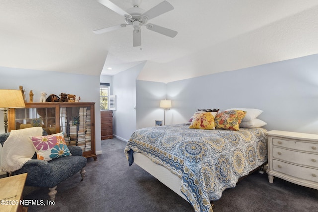 carpeted bedroom with lofted ceiling and ceiling fan