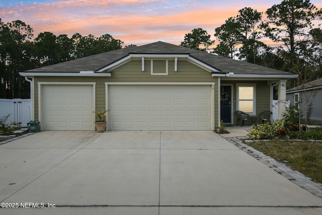 view of front of home featuring a garage