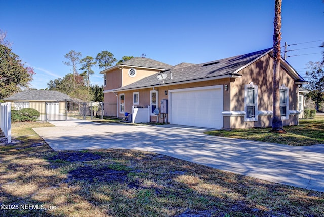 view of front of home with a garage