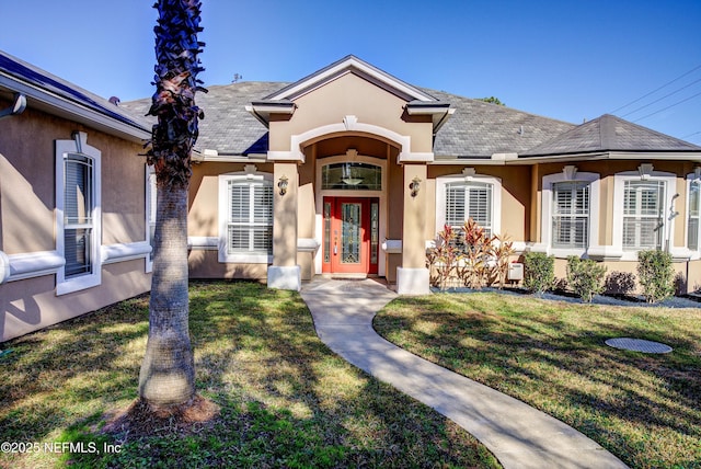 view of front of home with a front yard