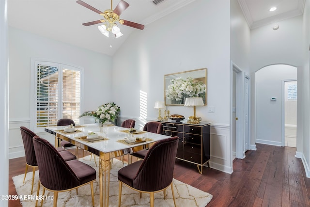 dining area featuring a healthy amount of sunlight and dark hardwood / wood-style floors