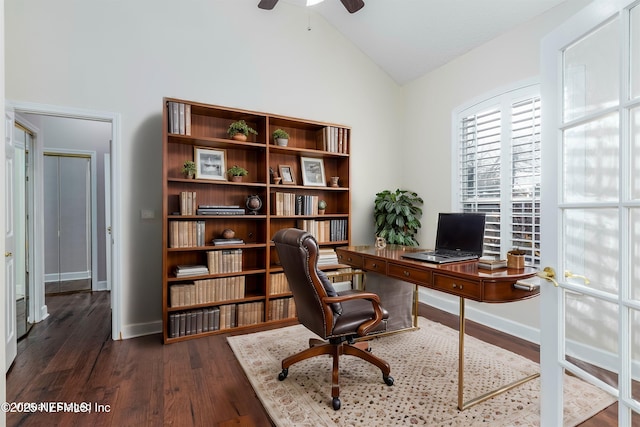 office area featuring lofted ceiling, dark wood-type flooring, and ceiling fan