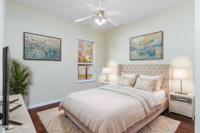 bedroom featuring dark hardwood / wood-style flooring