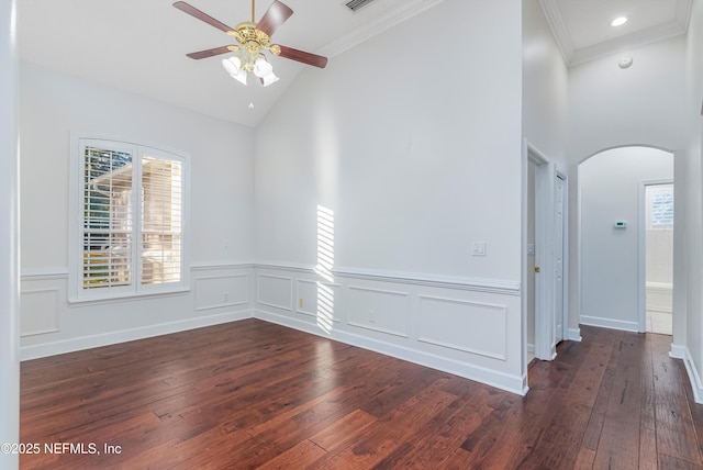 spare room featuring ceiling fan, ornamental molding, dark hardwood / wood-style flooring, and high vaulted ceiling