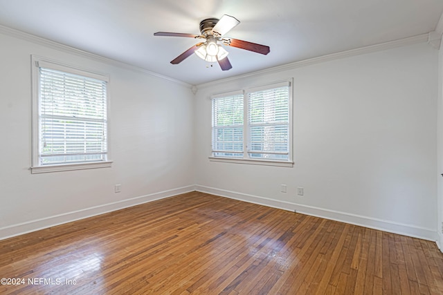 spare room with ornamental molding, hardwood / wood-style floors, and ceiling fan