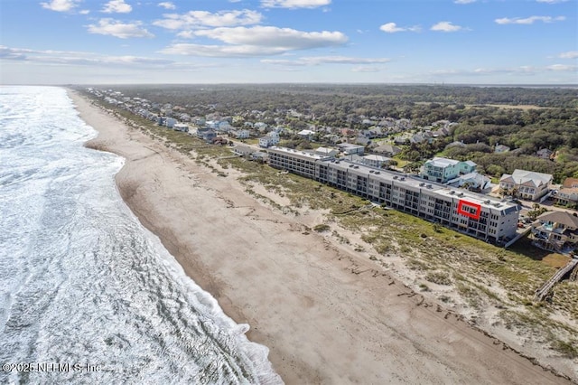 bird's eye view with a beach view and a water view