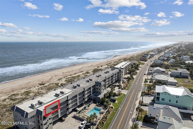 aerial view with a view of the beach and a water view