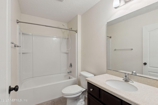 full bathroom with toilet, tub / shower combination, a textured ceiling, vanity, and tile patterned flooring