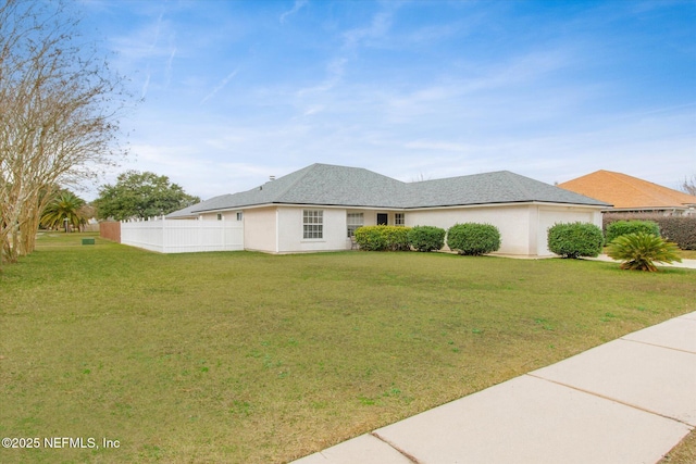 view of front facade with a front yard