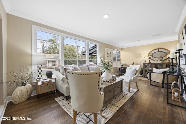 living room with dark wood-type flooring and ornamental molding