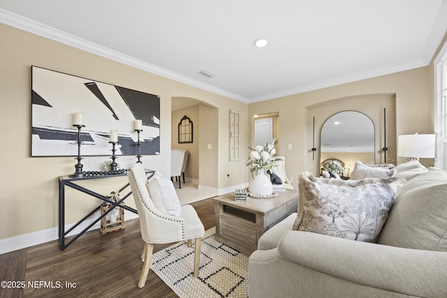 living room with crown molding and dark hardwood / wood-style flooring