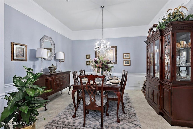 carpeted dining space with an inviting chandelier