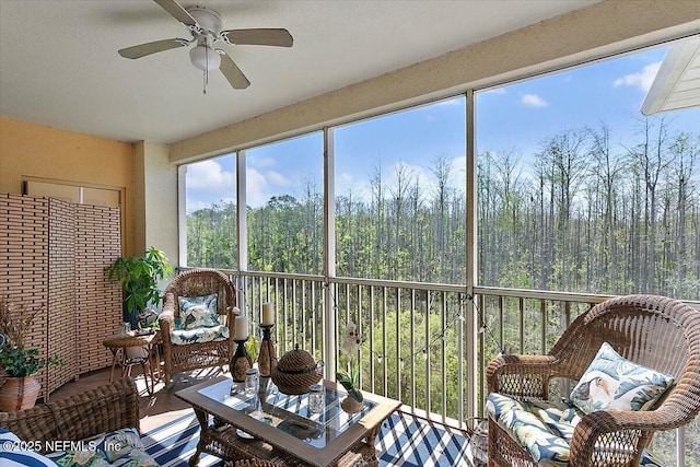 sunroom / solarium with ceiling fan