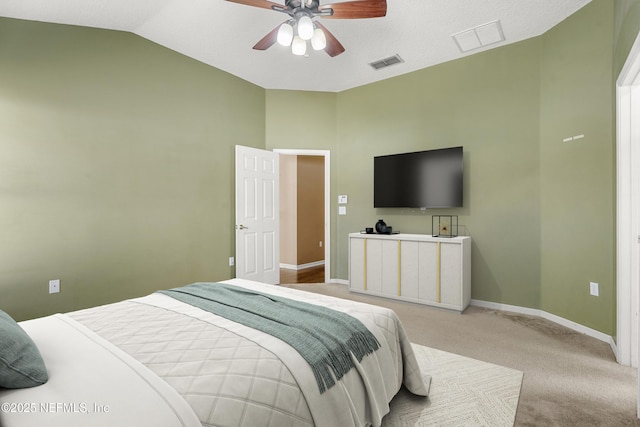 carpeted bedroom featuring lofted ceiling and ceiling fan