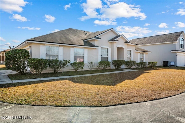 view of front of home with a front yard