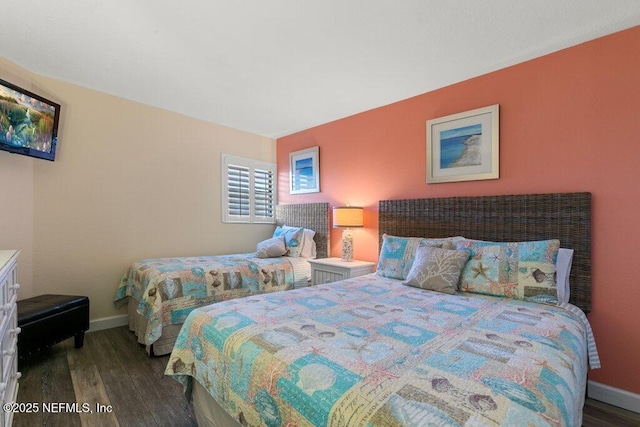 bedroom featuring dark hardwood / wood-style flooring