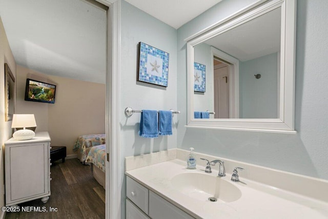 bathroom featuring vanity and hardwood / wood-style flooring