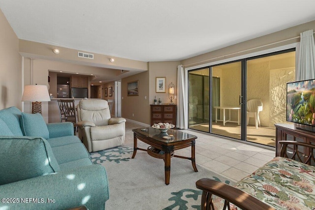 living room featuring light tile patterned flooring