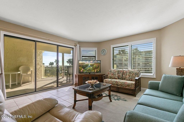 living room with light tile patterned floors