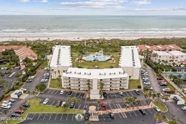 aerial view featuring a beach view and a water view