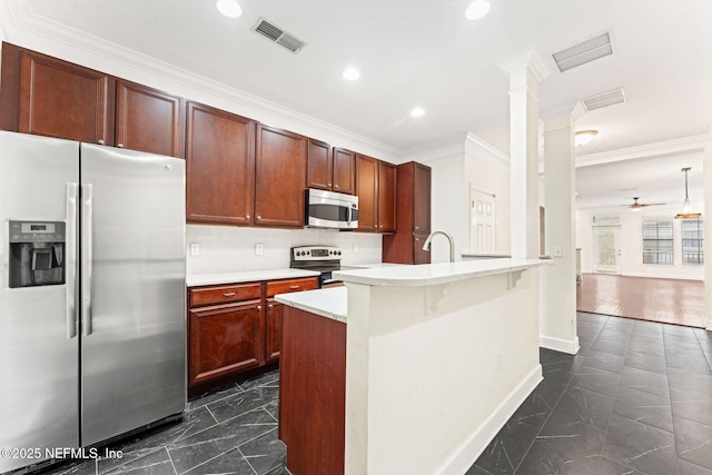 kitchen with a kitchen island with sink, visible vents, light countertops, appliances with stainless steel finishes, and marble finish floor