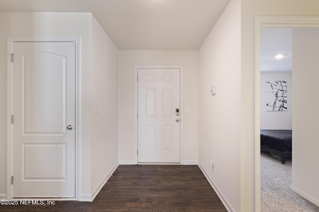 hall featuring dark hardwood / wood-style flooring