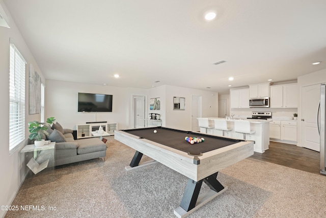 game room with billiards