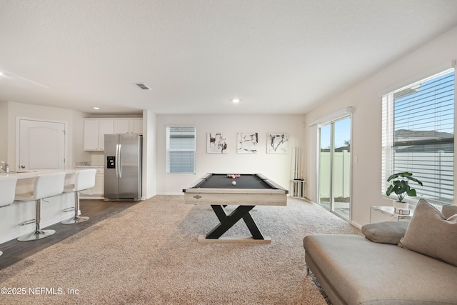 rec room featuring dark hardwood / wood-style flooring, sink, a textured ceiling, and billiards