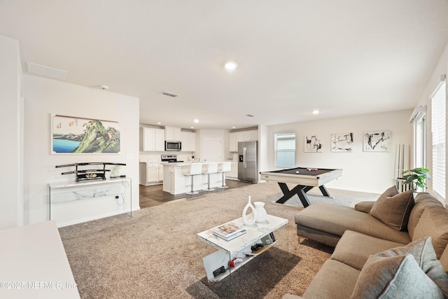 living room featuring pool table and carpet