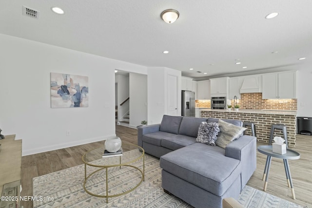 living room featuring light hardwood / wood-style flooring