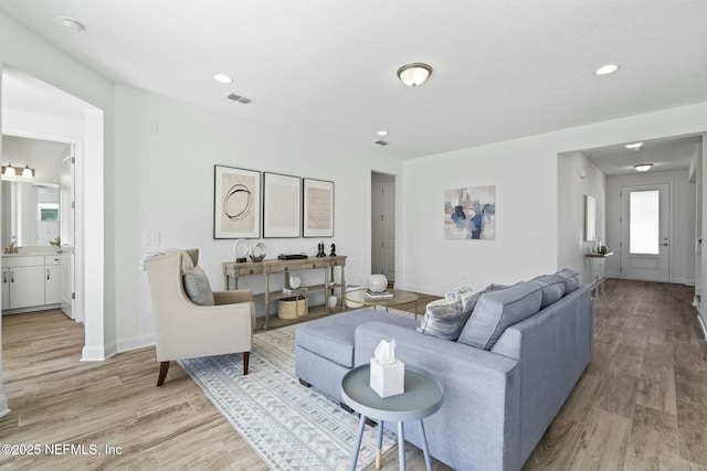 living room featuring light hardwood / wood-style floors