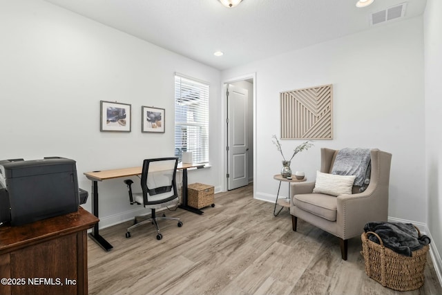 home office featuring light hardwood / wood-style flooring