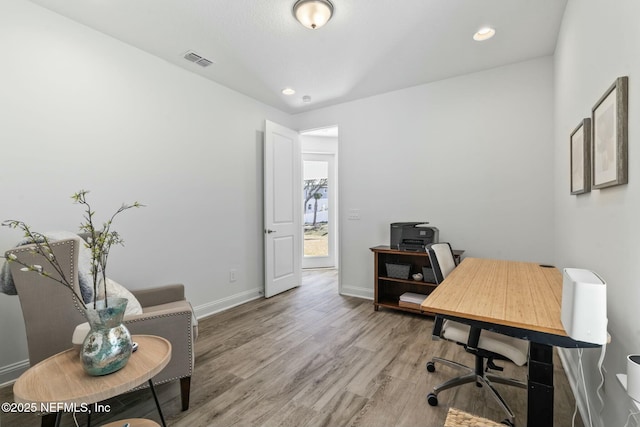 office with hardwood / wood-style floors