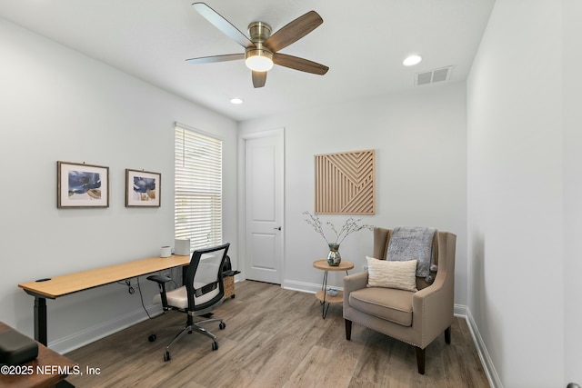 office featuring ceiling fan, visible vents, recessed lighting, wood finished floors, and baseboards