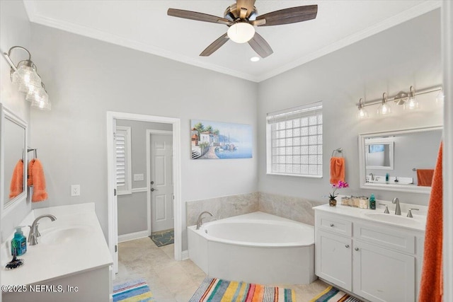 bathroom featuring ornamental molding, a tub, vanity, and ceiling fan