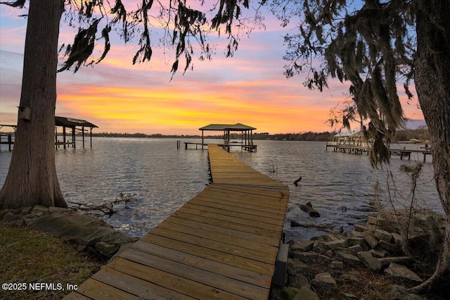 view of dock with a water view