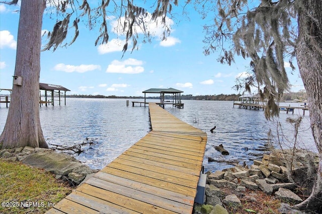 view of dock with a water view