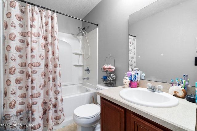 full bathroom featuring shower / tub combo with curtain, vanity, toilet, and a textured ceiling