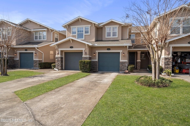 view of front of property featuring a garage and a front lawn