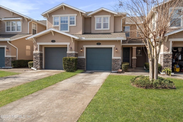 view of front of home with a garage and a front yard