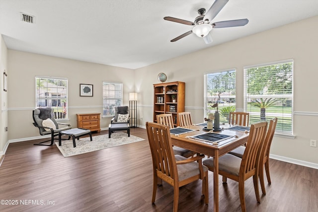 2360 Golfview Dr, Fleming Island, FL 32003 - dining room with dark wood-style floors, ceiling fan, an office area, and baseboards