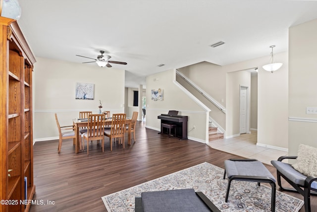 2360 Golfview Dr, Fleming Island, FL 32003 - living room featuring ceiling fan, stairs, wood finished floors, and baseboards